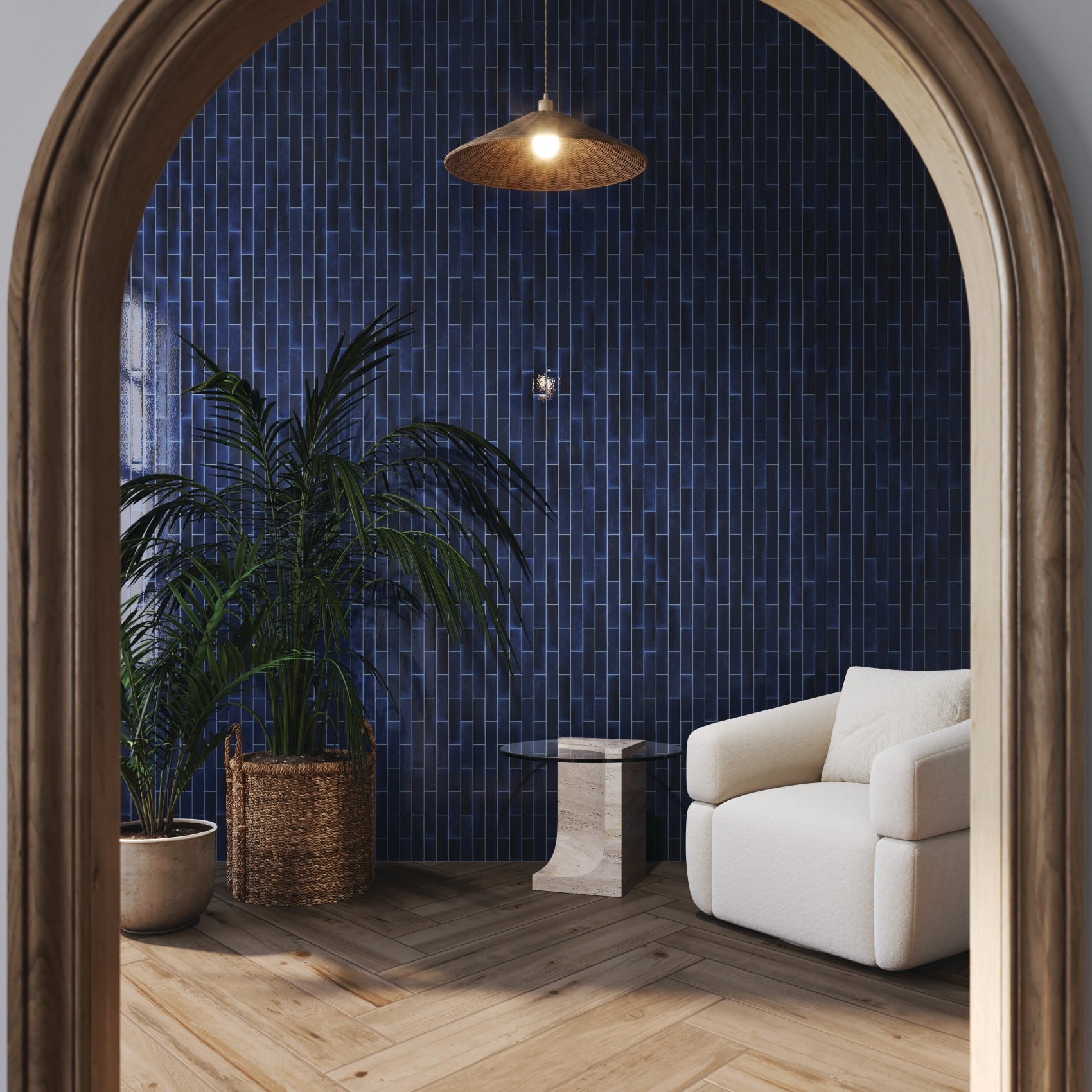 Lounge seating area with an arched entry door and a blue tiled wall.