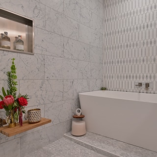 Wet room with white & gray vein marble wall tile, white & gray marble mosaic backsplash behind soaker tub, stainless steel shower niche, gray marble mosaic floor.