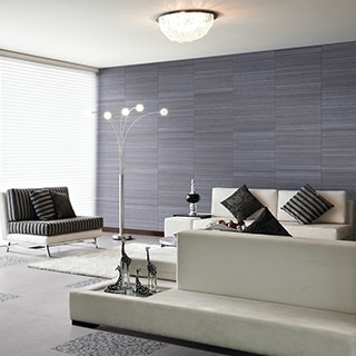 Modern living room with blue fabric look wall tile, arched floor lamp, white sofas, floor-to-ceiling windows, and gray fabric look floor tile.