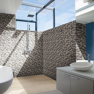 Bathroom with large skylight, soaker tub, large shower with neutral-colored variegated mosaic wall tile and wood-look shower floor tile.