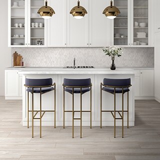 Kitchen with floor tiling that looks like white washed wood, white quartzite countertop, marble look white & beige hexagon tile backsplash, and white cabinets.