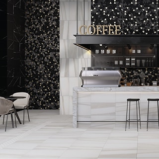 Coffee shop with 12x24, white & beige marble floor tile, black mosaic wall tile, marble countertop, "Coffee" sign suspended from the ceiling.