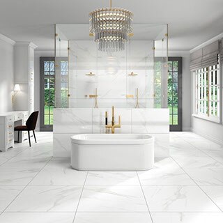 Modern bathroom with marble-look white and gray large format floor tile and shower tile, brass fixtures, and chandelier over soaker tub.