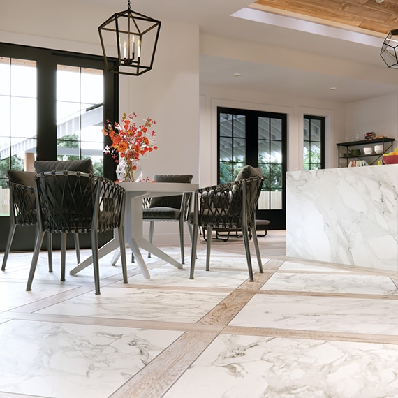 Modern farmhouse kitchen with 36x36 marble look tile and 6x48 wood look tile planks in a checkered diamond pattern, marble look porcelain waterfall island with wood cabinets.