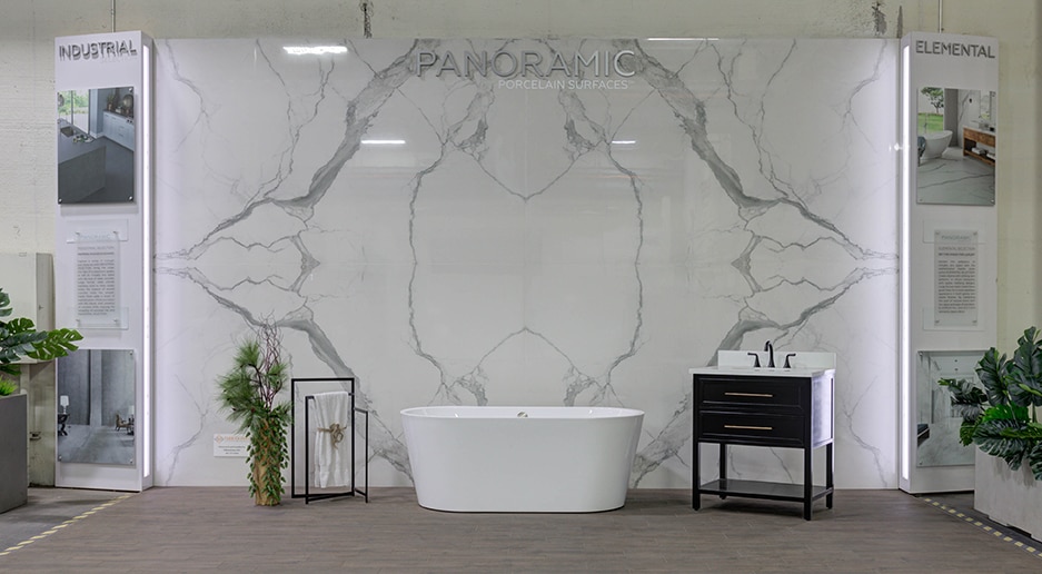 Stone center showing a white marble look slab in a bathroom setting.