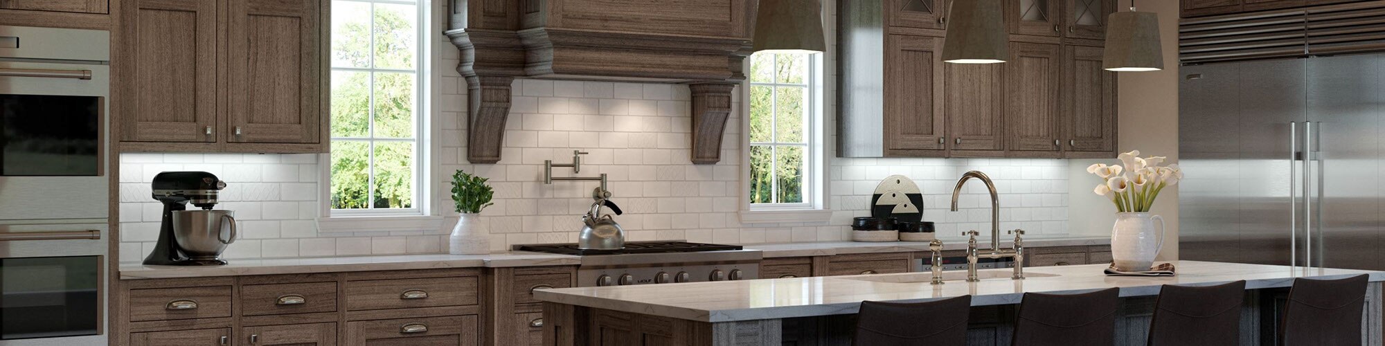 Modern farmhouse kitchen with off-white subway tile, off-white quartzite countertop, and natural wood cabinets.