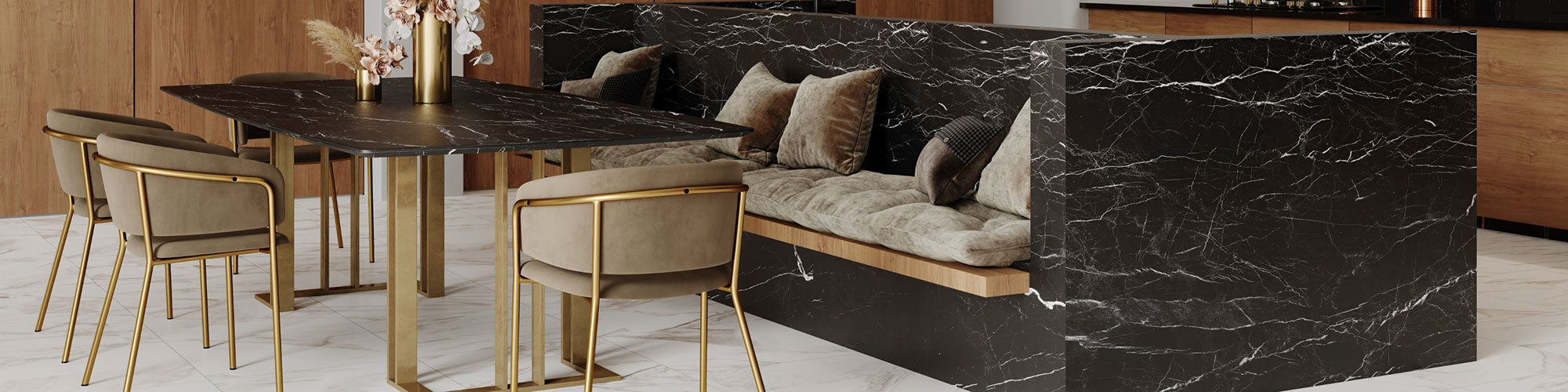 Elegant dining room with floor tile that looks like white marble, table top & sofa frame made of porcelain slab that looks like black marble with white veining, tan suede sofa cushions & chairs.