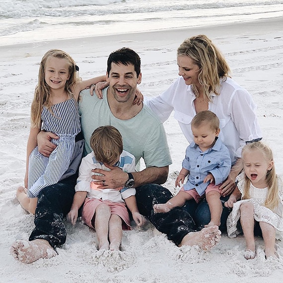 Instagram influencer Jennifer Gizzi with her husband and children.